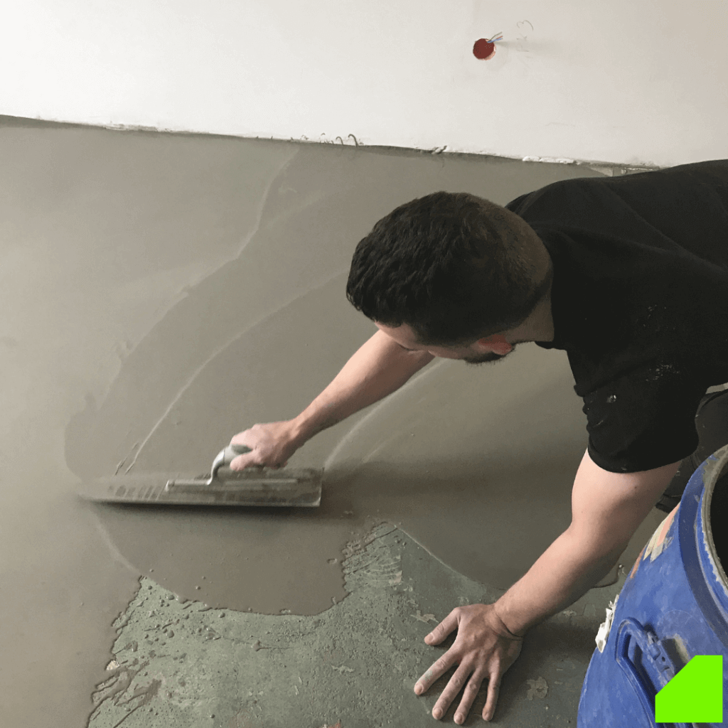 Application d’enduit sur sol